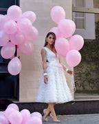 Vestido para ceremonia civil con escote, mangas y volantes